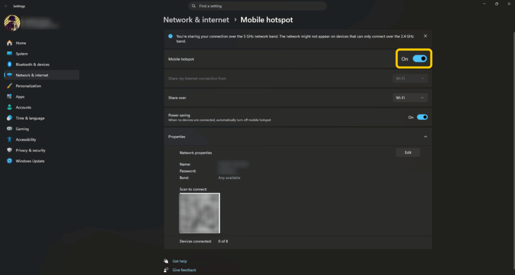 The Windows Mobile hotspot settings dashboard, showing that the Mobile hotspot is enabled over Wi-Fi.