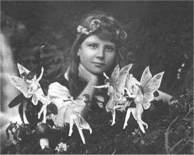 the Cottingley fairies in front of Frances Griffiths