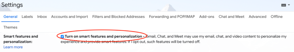 Screenshot of Gmail's Settings page with Turn on smart features and personalization option marked by a red circle.