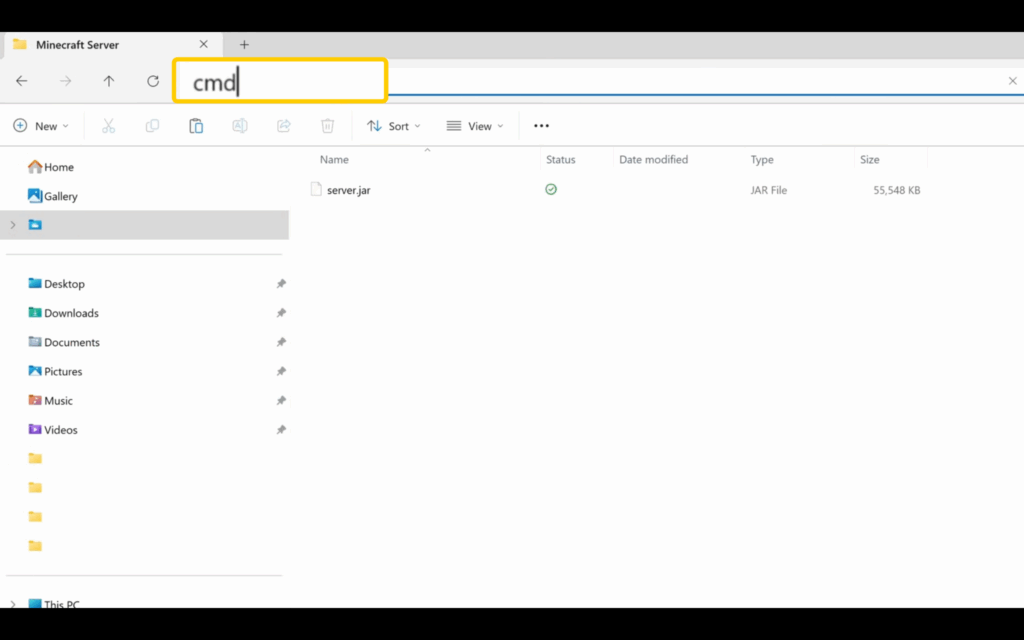 Typing cmd into the search bar with the server.jar file open.