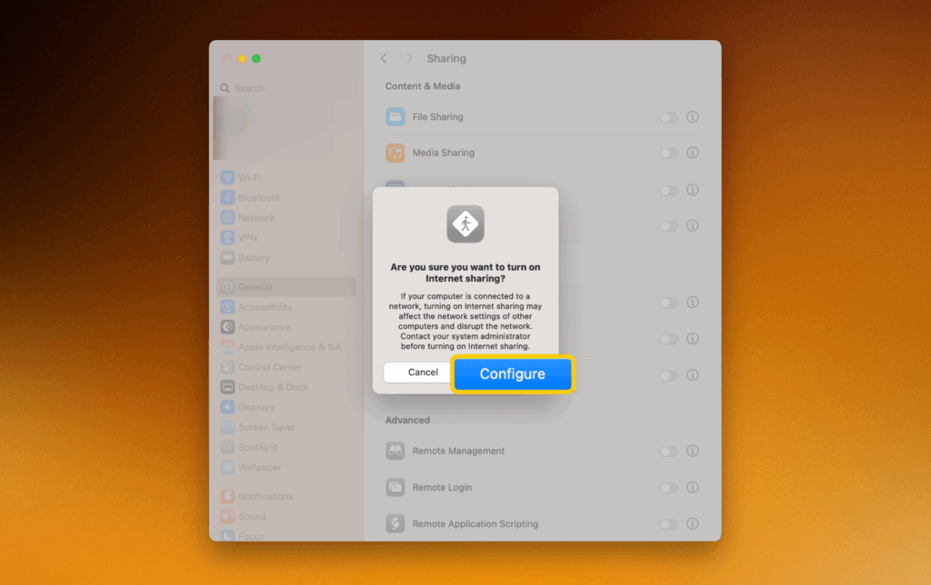 Confirming Internet Sharing on macOS by clicking Configure in the prompt.